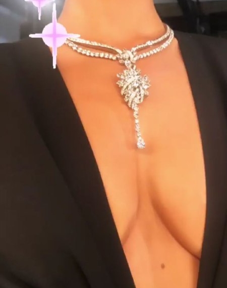 Sebastian Bear-McClard presented a necklace to Emily Ratajkowski